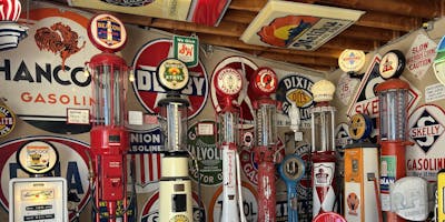 A beautiful collection of old gasoline pumps
